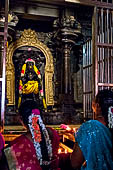 Worship and puja offerings inside the Swamimalai temple. 